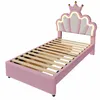A pink twin bed frame with a crown-shaped headboard. Produktbild-Vorschau