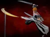 An action figure of Ichigo Kurosaki from Bleach, in a dynamic pose with two swords and a yellow energy effect. Anteprima dell’immagine prodotto