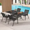 A patio dining set with a table and chairs next to a swimming pool. Náhled obrázku produktu