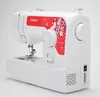 A close-up, angled shot of a white Brother sewing machine with red and floral accents. Náhled obrázku produktu