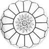 A white and black Moroccan leather pouf with intricate embroidery. Produktbild-Vorschau
