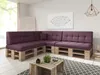 A modern living room with a purple pallet sofa and a wooden coffee table. Produktbild-Vorschau