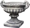 A stone urn on a pedestal, isolated on a white background. Produktbild-Vorschau