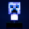 A Minecraft Creeper lamp is displayed against a dark blue background. Náhled obrázku produktu