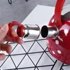 Teiera rossa in acciaio inox con puntini e fischietto Anteprima dell’immagine prodotto 14