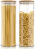 Two glass storage jars filled with pasta, one with spaghetti and the other with fusilli, are shown side-by-side on a white background. Náhled obrázku produktu