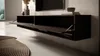A modern living room with a wall-mounted TV cabinet. Anteprima dell’immagine prodotto