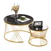 Two round coffee tables of different sizes with black marble-look tops and gold metal frames, displayed on a white background. Náhľad obrázku produktu