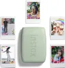 A green Instax mini Link 3 photo printer is shown surrounded by five printed photos featuring people and various scenes. Náhľad obrázku produktu