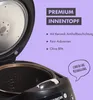 Close-up of the inside of a rice cooker with text overlays describing its features. Anteprima dell’immagine prodotto