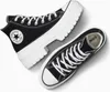 A pair of black Converse Chuck Taylor All Star Lugged Heel sneakers with white laces and soles, shown from a top-down perspective against a white and light gray background. Náhľad obrázku produktu