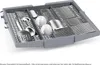 A close-up view of a dishwasher basket filled with cutlery and two small cups. Produktbild-Vorschau