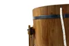 A close-up view of a wooden bucket with a metal band. Produktbild-Vorschau