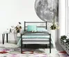 A bedroom scene with a bed, nightstand, and rug. Voir les images du produit