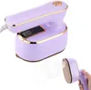 A purple handheld garment steamer is shown being used, with steam emitting from the front. Another view of the steamer is shown in the background. Produktbild-Vorschau