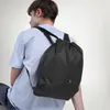 A person wearing a backpack. Produktbild-Vorschau