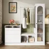 A white entryway furniture set with a hanging rack, bench, and storage cabinets. Produktbild-Vorschau