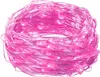 A coiled string of pink LED lights on a white background. Voir les images du produit