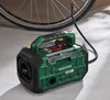 A Parkside battery-powered compressor and air pump is shown connected to a bicycle tire. Produktbild-Vorschau