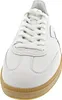 A close-up, front-facing view of a white leather sneaker with a tan rubber sole. Produktbild-Vorschau
