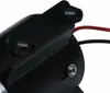 A close-up view of a black pump with a metal bracket and rubber mounts. Red and black wires are visible. Produktbild-Vorschau