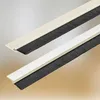 Two strips of brush seal weatherstripping are shown diagonally against a gradient background. Náhled obrázku produktu