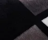A close-up view of a textured fabric with a geometric pattern. Produktbild-Vorschau