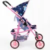 A side view of a pink and navy blue doll stroller with a butterfly pattern, set against a white background. Produktbild-Vorschau
