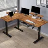 An L-shaped standing desk setup with dual monitors, keyboard, tablet, and printer. Voir les images du produit