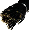 A close-up view of a bundle of warm white LED string lights with black wires, coiled together. Podgląd zdjęcia produktu