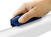 A hand holding a blue ski edge sharpener on a white surface. Podgląd zdjęcia produktu