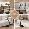 A collage of four images showing a round side table with a curved black metal base and a wood-look top, presented in different room settings (living room, bedroom) and labeled for various uses (coffee table, nightstand, sofa table, laptop table). Produktbild-Vorschau