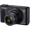 A black Canon PowerShot SX740 HS digital camera is shown from a three-quarter angle against a white background. Podgląd zdjęcia produktu