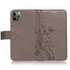 A gray flip case for a smartphone, open to show the inside. Produktbild-Vorschau