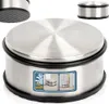 A stainless steel door stopper with a black rubber base and ring, shown in a studio setting with inset images demonstrating its use. Anteprima dell’immagine prodotto