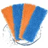 Four microfiber mop pads, two orange and two blue, are fanned out with water splashes around them. Produktbild-Vorschau