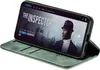 A smartphone in a green flip case is displayed on a surface, showing a movie poster on its screen. Produktbild-Vorschau