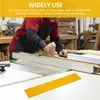A person is using a tool in a workshop setting. Náhled obrázku produktu