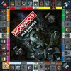 A top-down view of a Monopoly board game with a Warhammer 40,000 theme. The board is laid out with various property spaces, chance cards, and game pieces visible. The central area features prominent Warhammer 40,000 artwork. Produktbild-Vorschau