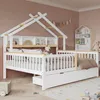 A child's bedroom with a white and natural wood house-shaped bed with a pull-out drawer and a bookshelf headboard. The room has pink walls and a colorful rug. Náhled obrázku produktu