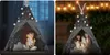 Two images of a children's teepee tent, one indoors with a child and one outdoors with two children, both lit by fairy lights. Produktbild-Vorschau