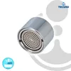 A close-up of a chrome faucet aerator with a gray mesh insert, set against a white and light gray background with abstract water droplet shapes. A logo and brand name are visible in the upper right corner, and a smaller circular logo with icons and text is Produktbild-Vorschau