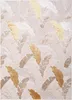A flat lay of a rug with a leaf pattern. Anteprima dell’immagine prodotto