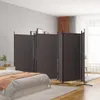 A bedroom scene with a bed and a room divider. Produktbild-Vorschau