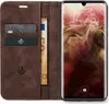 A brown leather flip case for a smartphone, open to reveal card slots and a banknote, with the smartphone screen displaying the time and date. Produktbild-Vorschau