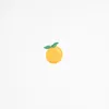 A single orange with two green leaves on a white background. Produktbild-Vorschau