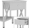 A collage of images showing a white nightstand from different angles, including a close-up of the drawer and the legs. Voir les images du produit