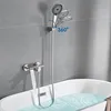 A bathtub faucet and showerhead in a bathroom. Produktbild-Vorschau
