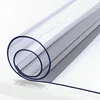 A rolled-up transparent sheet of plastic on a white surface. Náhled obrázku produktu
