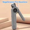 A close-up shot of a gray pet nail clipper with a digital display and LED light, set against a soft, gradient background. Produktbild-Vorschau